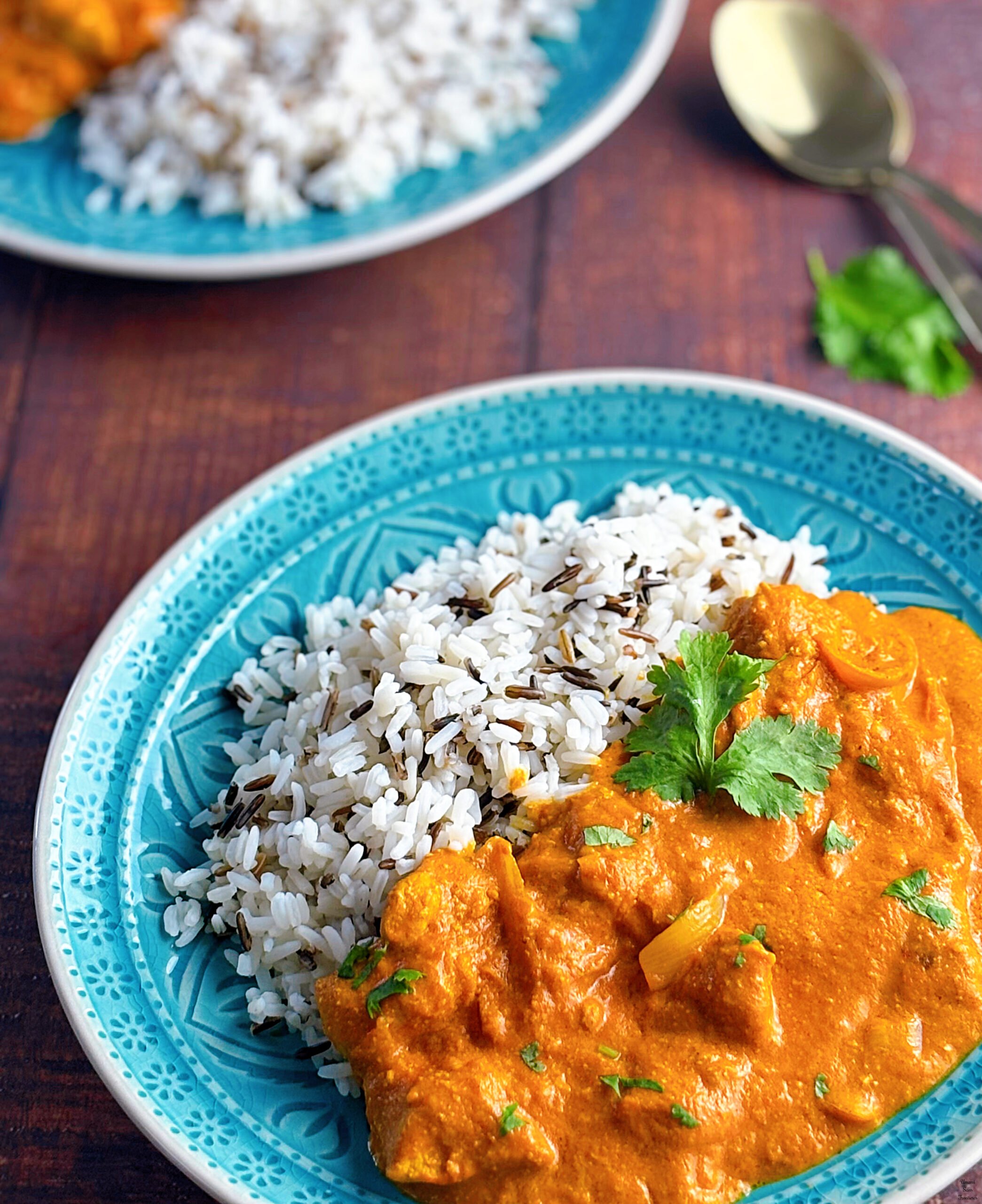 Butter chicken curry butter chicken curry coriander wild rice spoons