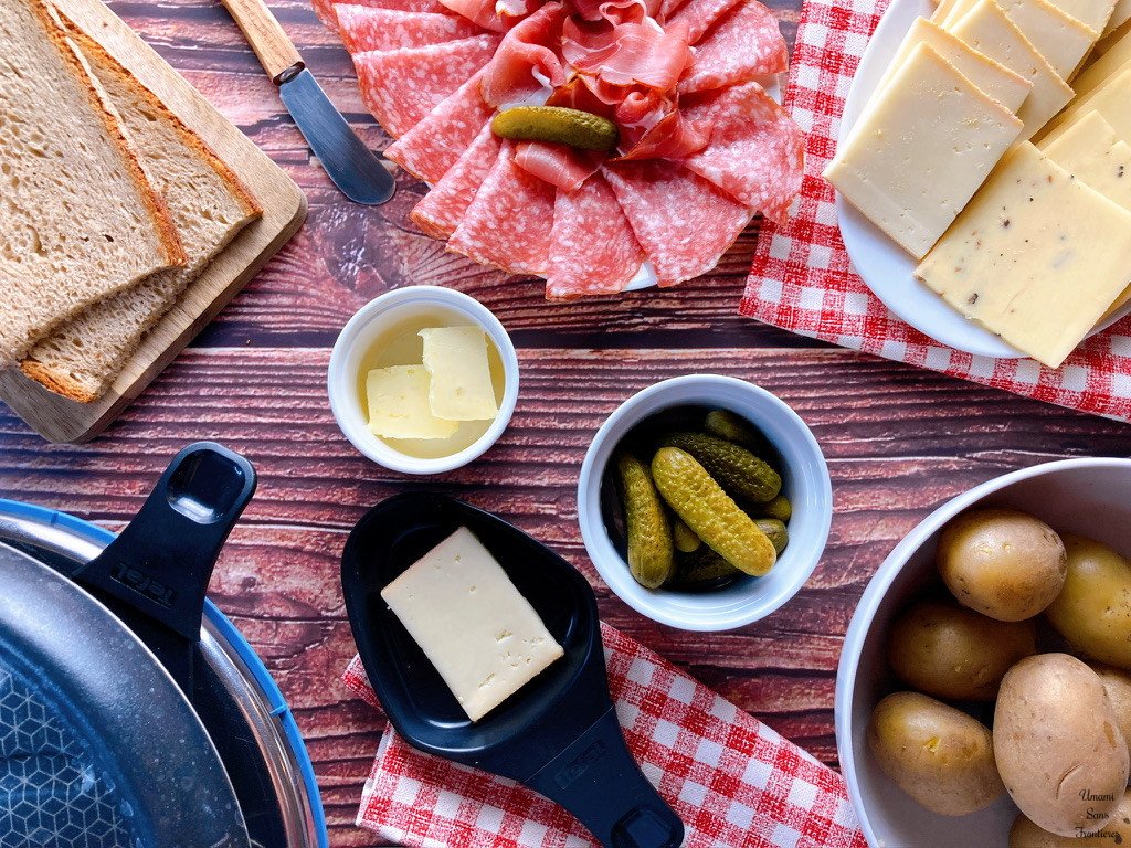 Raclette bread Raclette cheese cornidhon Cured meats potatoes butter