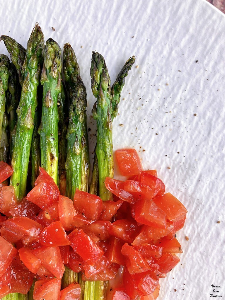 Up photo with asparagus and tomatoes