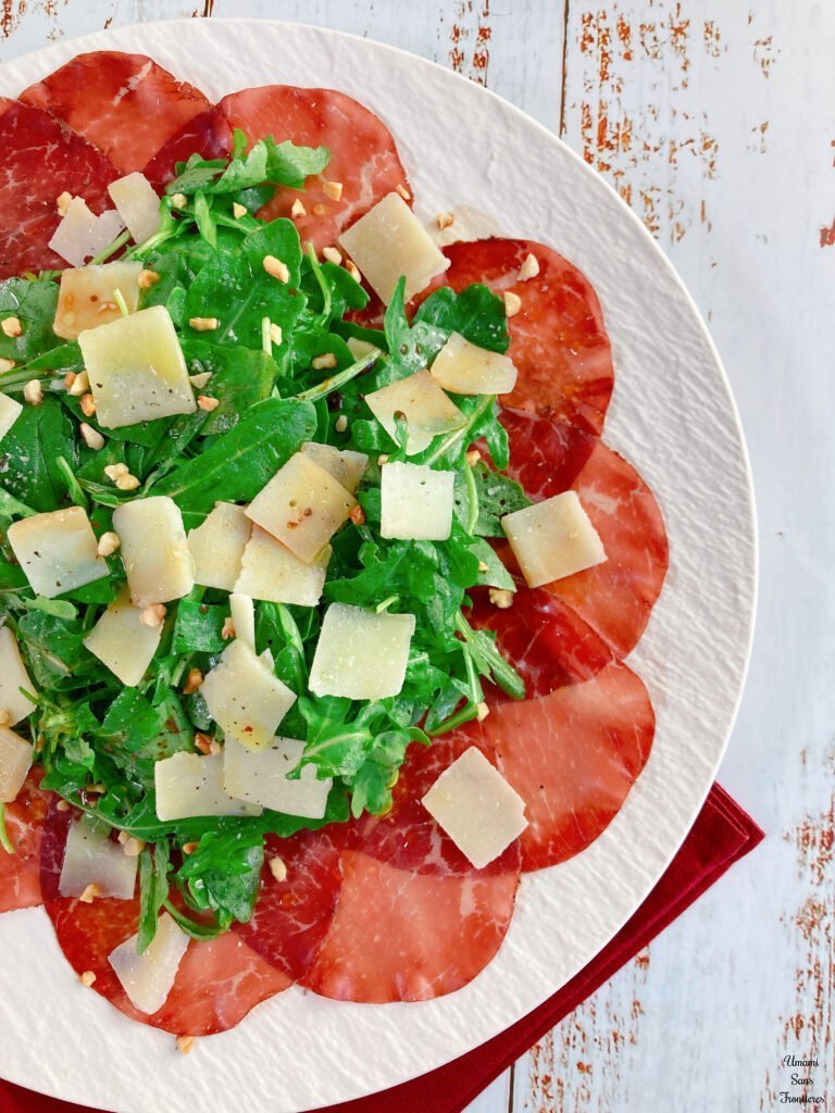 Italian Salad with Prosciutto, Arugula, and Grana Padano red napkin
