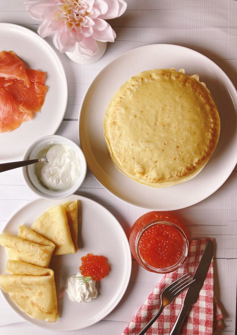 Russian blini caviar salmon flower knife fork