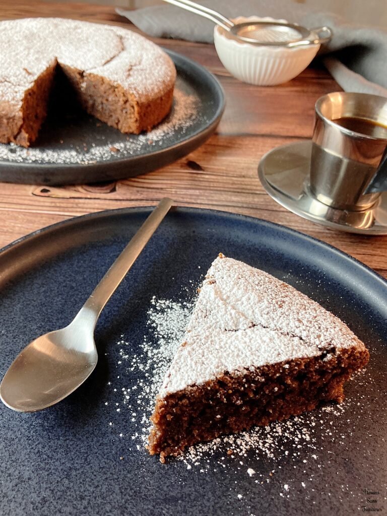 piece of torta caprese and hole chocolate cake coffee